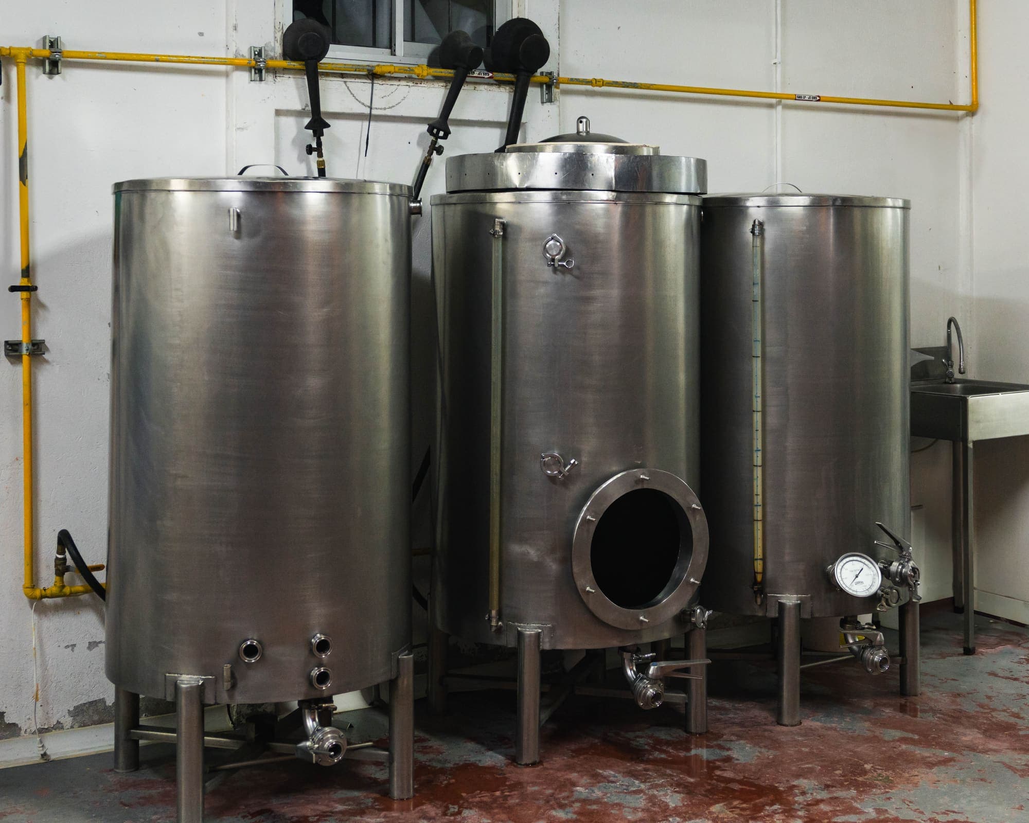 The three Monteverde Brewing Company brewhouse kettles
