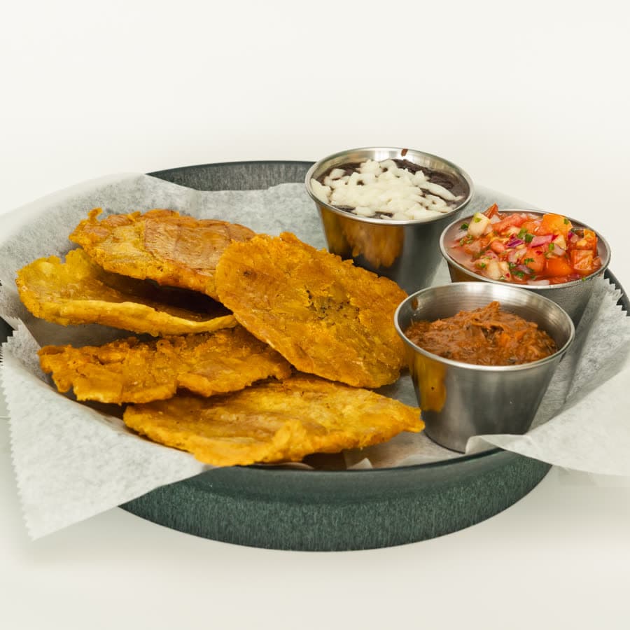 Green plantain patacones with two dipping sauces